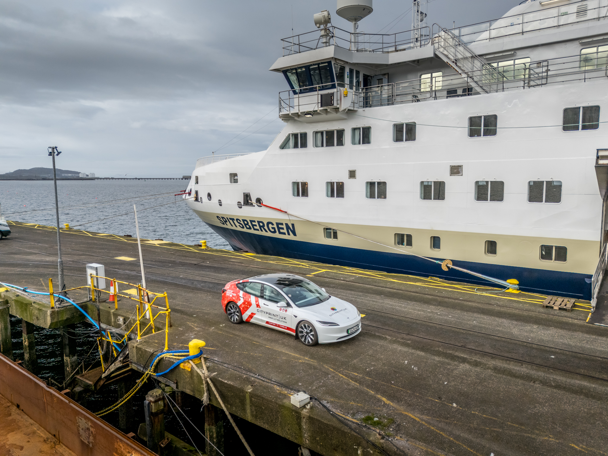 City Print UK managed print services rapid response car on the quayside beside the ship Spitsbergen